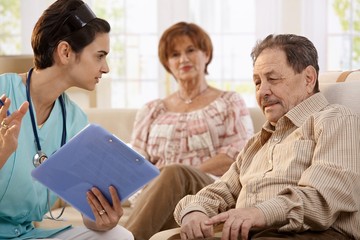 Healthcare worker at home of pensioners