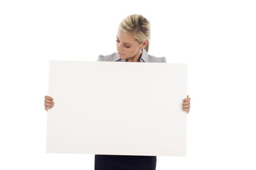 Beautiful business woman holding a white board