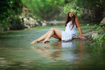 Beautiful girl in river