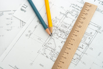 Architectural plans and blueprints in office