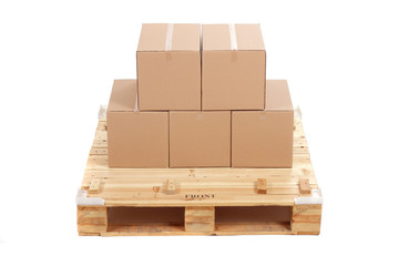 cardboard boxes on wooden palette