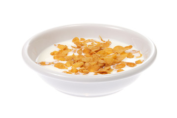 Bowl with corn flakes and milk