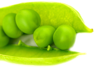 Fresh peas on white background