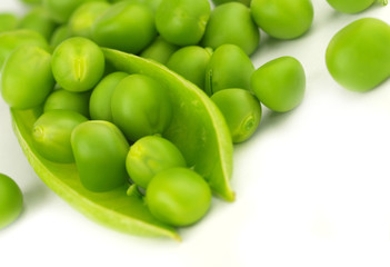 Fresh peas on white background