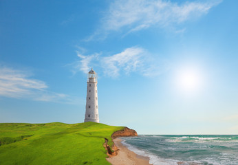 Old lighthouse on sea coast