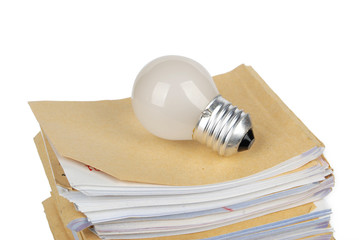 a light bulb on documents