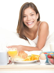 Obraz na płótnie Canvas Breakfast in bed woman