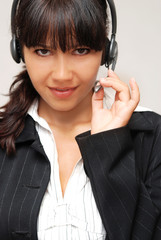 Young beautiful woman with headset