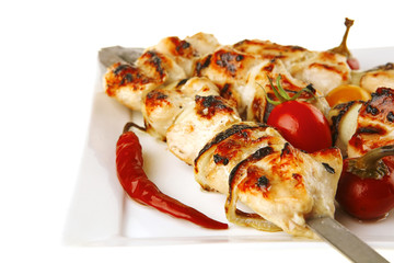 roasted chicken kebab on white