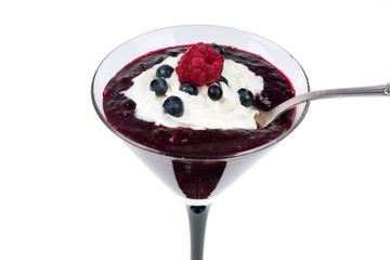 Huckleberry cocktail with whipped cream