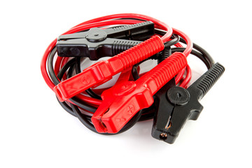 pair of jumper cables over white background