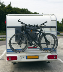 bicycles on the back of a caravan
