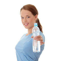 Teen woman drinking water
