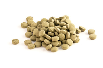 Herb Medicine Pellets isolated on white