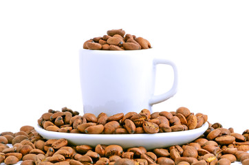 white cup filled with coffee beans