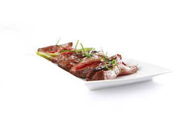 meat on white plate