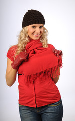 The attractive blond woman in the winter clothes