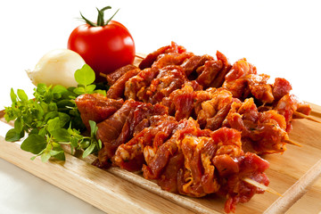 Row meat prepared to grill