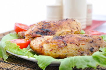 Roasted chicken drumsticks and vegetables