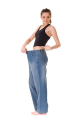 attractive female shows how her old huge jeans, wieght loss conc