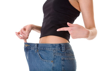 attractive female shows how her old huge jeans, wieght loss conc