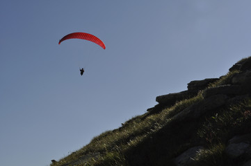Fototapeta na wymiar Paraglider over grass