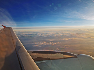 Fototapeta na wymiar sunset view from an airplane window