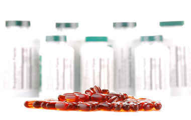 Composition with containers of dietary supplements and capsules