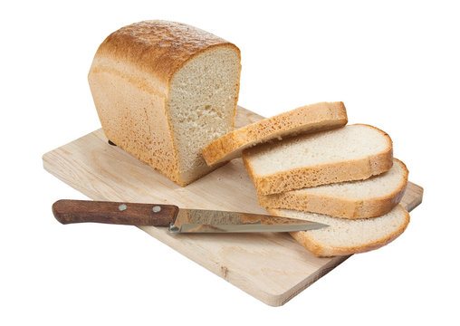 bread with a knife on a cutting board