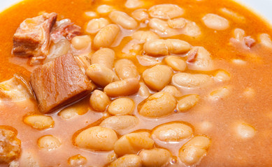 baked beans in a plate detail closeup