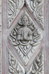 Fototapeta na wymiar art on pillar, Wat Prang Ku Ban Kwao, Mahasarakam
