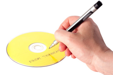 Man's hand, writing on CD