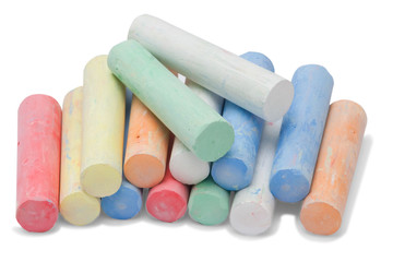 Colored pieces of chalk isolated on white