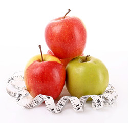 Apples and a measure tape, diet concept