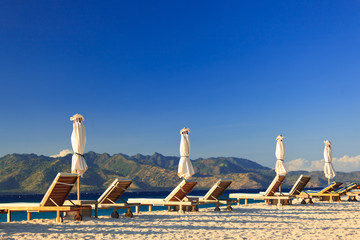 view of chairs and umbrellas on the beach