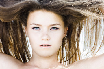 Obraz premium Beautiful girl with luxuriant hair