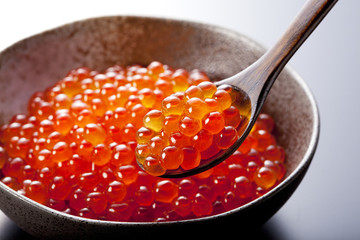 red caviar on the spoon