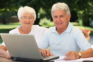 Senior couple surfing on internet