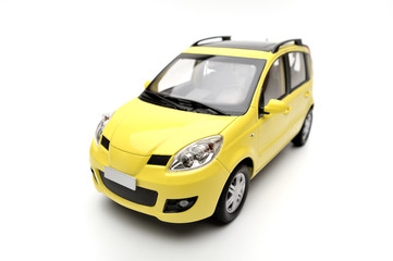 Generic modern yellow family car model on a white background
