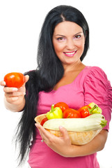 Happy woman giving tomato