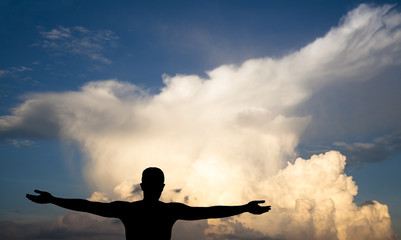 young Man on clouds, black silhouette