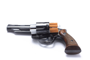 Revolver loaded with cigarettes