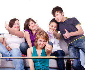 teenagers holding thumbs up