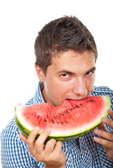 Portrait of man bite water melon