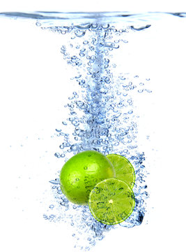 Fresh lime dropped into the water