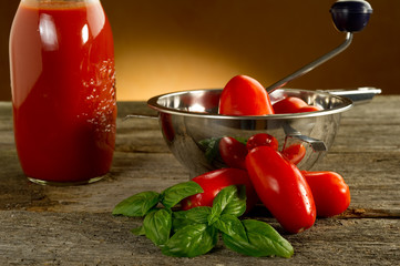 food mill with tomatoes and sauce © Marco Mayer