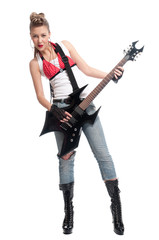 Young rock woman with electric guitar