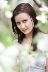 Naklejka premium attractive young woman in park