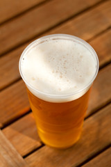 beer standing on a wooden table