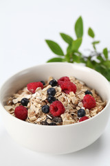 Granola with raspberries and blueberries